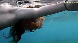 In Tenerife, Hot Ginger Teen 18+ Swims Underwater, Showing Off Bikini in Public Pool Scene