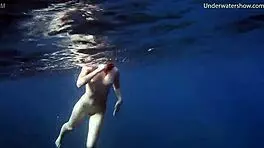 In Tenerife, Hot Ginger Teen 18+ Swims Underwater, Showing Off Bikini in Public Pool Scene
