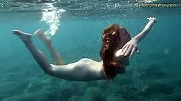 In Tenerife, Hot Ginger Teen 18+ Swims Underwater, Showing Off Bikini in Public Pool Scene