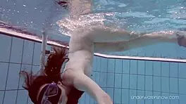 Intense underwater naked bathing session with slut roxalana cheh exposing small brunette tits