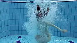 Intense underwater naked bathing session with slut roxalana cheh exposing small brunette tits