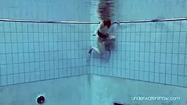 Intense underwater naked bathing session with slut roxalana cheh exposing small brunette tits