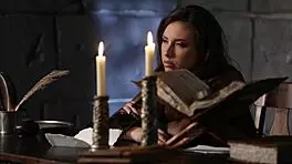 i'm a brunette in medieval fantasy, masturbating while writing a letter.