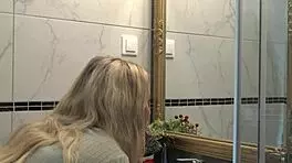 My sexy blonde wife switching panties in bathroom, she's so hot!