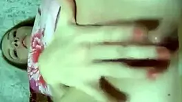 Young girl masturbates on webcam while fingering for phone sex.