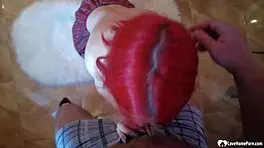 tattooed teen sucks cock on her knees in the kitchen