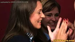 Savannah Secret in a CFNM Femdom Session with Group Participation.