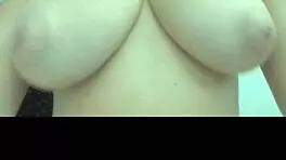 Teen 18+ girl displays her big natural tits in close-up view