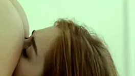 Redhead and blonde eat pussy after lingerie try-on