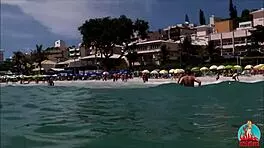 My Husband, My Unicorn, and Me Engage in Playful Activities on a Public Beach