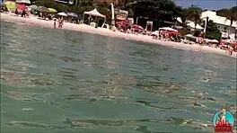 My Husband, My Unicorn, and Me Engage in Playful Activities on a Public Beach