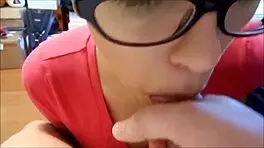 Amateur babe with glasses performs blowjob and swallow in POV