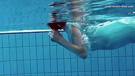 Hot Teen Swims And Strips Underwater!