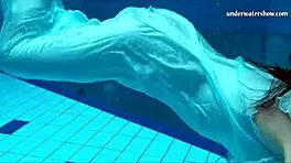 Hot Teen Swims And Strips Underwater!