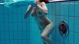 Hot Teen Swims And Strips Underwater!