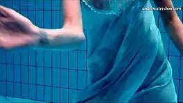 Hot Teen Swims And Strips Underwater!