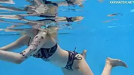 nude swimming in the pool babe with tattoos mimi cica