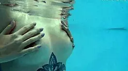 nude swimming in the pool babe with tattoos mimi cica