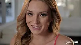 Cherry of the Month Charlotte Sins, tattooed blonde with pierced nipples, strips from red lingerie to masturbate