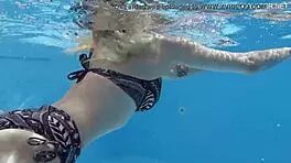 nude swimming in the pool babe with tattoos mimi cica