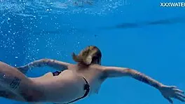 nude swimming in the pool babe with tattoos mimi cica