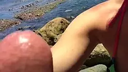Teen gulps cum on beach after messy blowjob