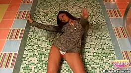 the petite 18+ teen flashes her panties under skirt outdoors for fun.