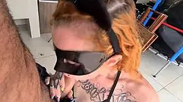 Eating the masked kitten on the table