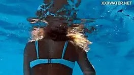 Hungarian blonde skinny pornstar enjoys swimming in the pool