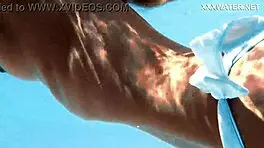 Hungarian blonde skinny pornstar enjoys swimming in the pool