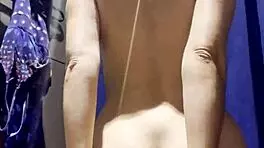 I set up a hidden camera in the department store fitting room.