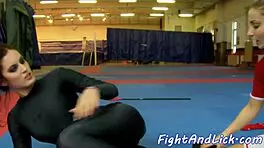 Spandex-clad lesbians wrestle and get licked by teen 18+ cheerleaders