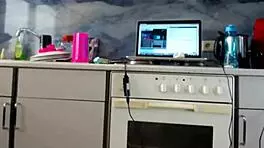 watch sexydeas tease her big ass and shaved pussy in a sizzling kitchen webcam show