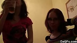 Two teen lesbians play with camera in bedroom