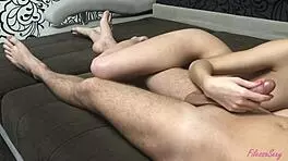 Young girl feels intense pleasure jerking off a hard cock until explosive cumshot in homemade setting