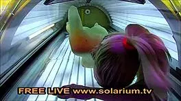 Hey, see this blonde teen 18+ fingering herself in public solarium?