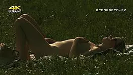 Young Girl With Small Tits Masturbates Outdoors On Grass