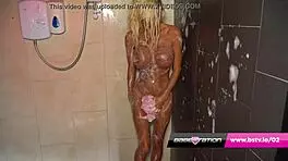 Enjoying a soapy shower with skinny British blonde Kerrie Lee