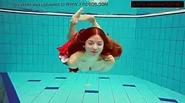 Hairy ginger Polish teen 18+ swims naked in pool underwater, showing tits in bikini