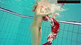 Hairy ginger Polish teen 18+ swims naked in pool underwater, showing tits in bikini