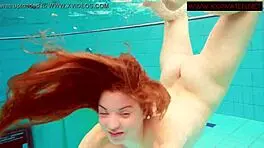 Hairy ginger Polish teen 18+ swims naked in pool underwater, showing tits in bikini