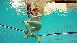Hairy ginger Polish teen 18+ swims naked in pool underwater, showing tits in bikini