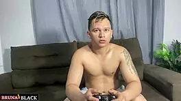 Petite latina strips naked while he plays video game, offering her big clit pussy for monster cock fuck and cum