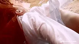 big tits redhead lola goes nude underwater in pool with friend