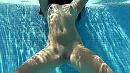 Jessica Lincoln, tatted Russian teen, bares small tits by pool