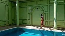 Jessica Lincoln, tatted Russian teen, bares small tits by pool