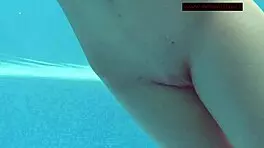 Lina Mercury shows big tits underwater in pool
