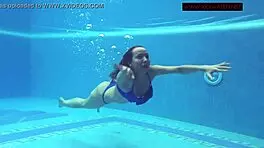 Lina Mercury shows big tits underwater in pool