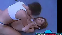 Vintage wrestling turns into cute lesbian threesome action. Hot stuff! 🔥