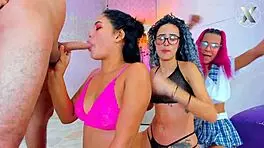 intriguing group takes turns sucking friend's big cock